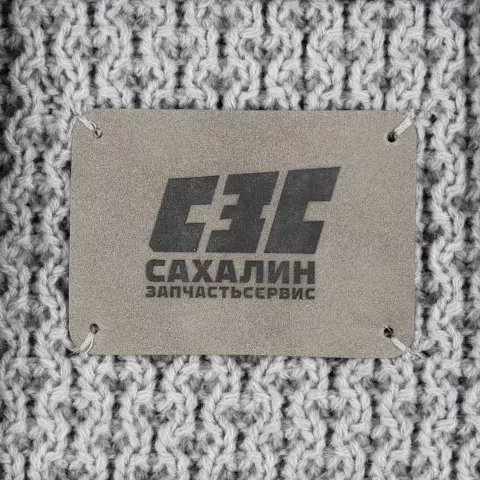 Тиснение: Лейбл Eta Nubuck — пример нанесения логотипа