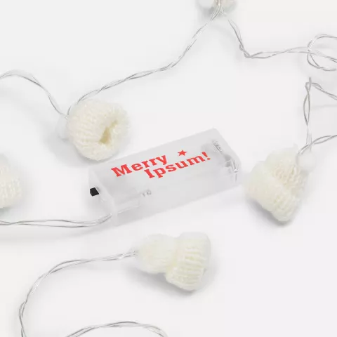 УФ-DTF: Гирлянда Cosy Poms — пример нанесения логотипа