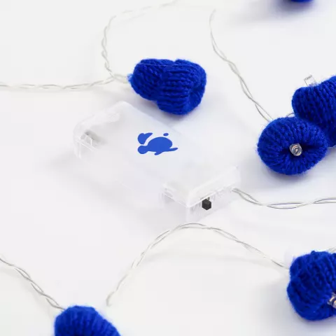 УФ-DTF: Гирлянда Cosy Poms — пример нанесения логотипа